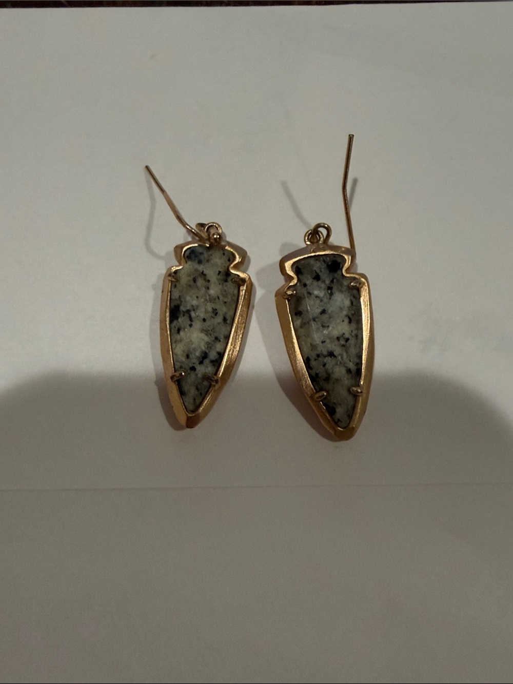 Kendra Scott Gold Arrowhead Drop Earrings with Speckled White Stone